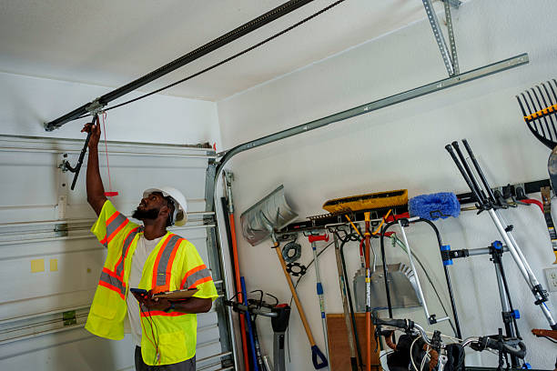 Professional Garage Door Panel Replacement technician working in Hurley, WI